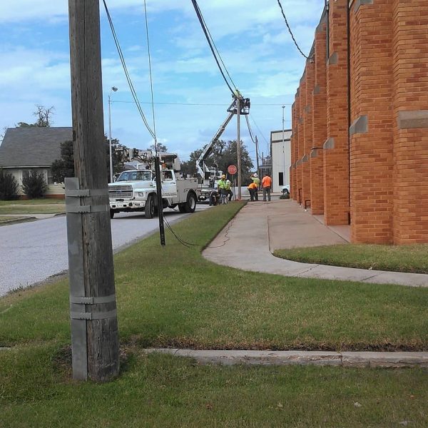 Workers from USA Construction Company of Oklahoma City begin placing the first new fiber optic lines just north of our office in Carnegie